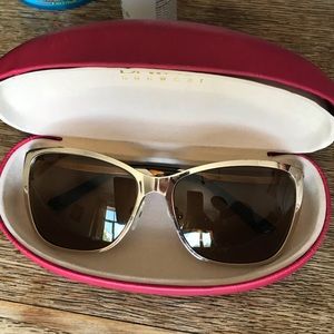 Gold framed prescription sunglasses